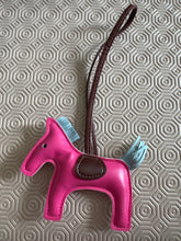 Load image into Gallery viewer, Lucky Horse charm for attracting your goals and wishes can be hung up or used as a bag charm or kept around you.