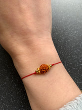 Load image into Gallery viewer, EXTREMELY Lucky Rudraksha Intention Tie Bracelet for Protection, Wealth, Focus, Anxiety, Stability &amp; Love
