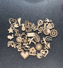 Load image into Gallery viewer, 36 Wooden Charms for Divination Charm Casting Mixed Assortment Pieces Hearts, Flowers, Airplanes, Shell &amp; More
